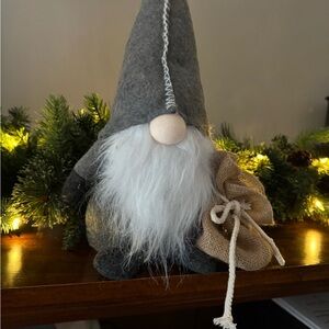 Festive Gray Gnome with White Beard and Burlap Sack